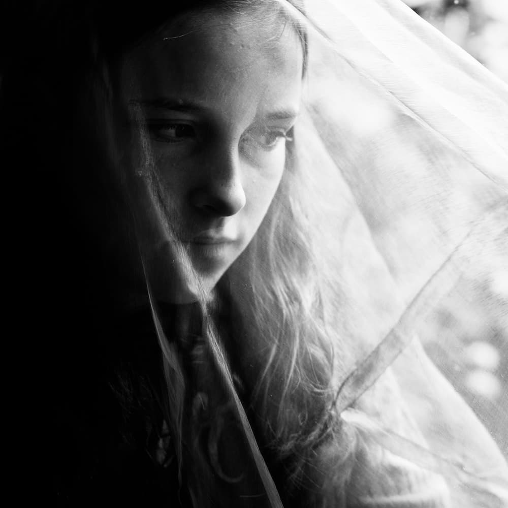 Pensive Young Woman by Mirjam Delrue — canvas wall art