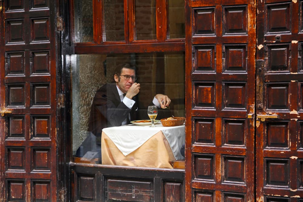 Pensive Man Cafe Window by Igor Shrayer — canvas wall art