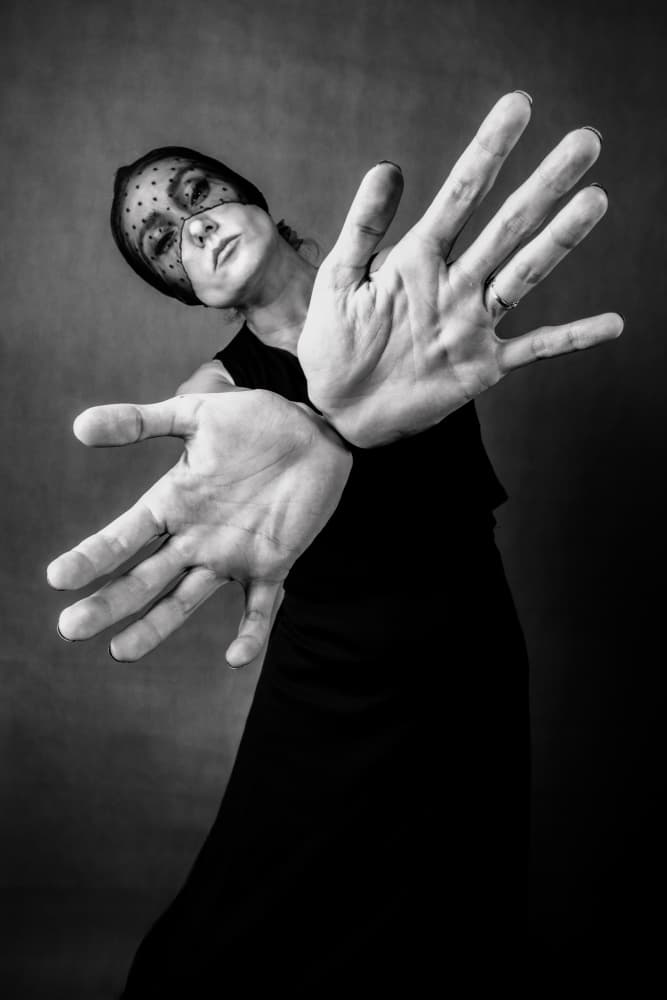 Veiled Woman Open Hands by Afshin Saeidinia — canvas wall art