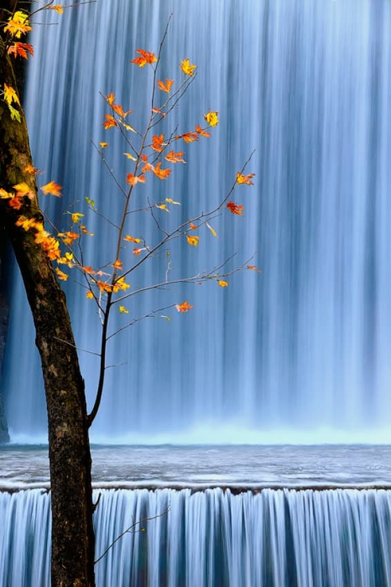 Tranquil Autumn Waterfall by Maria Kaimaki — canvas wall art