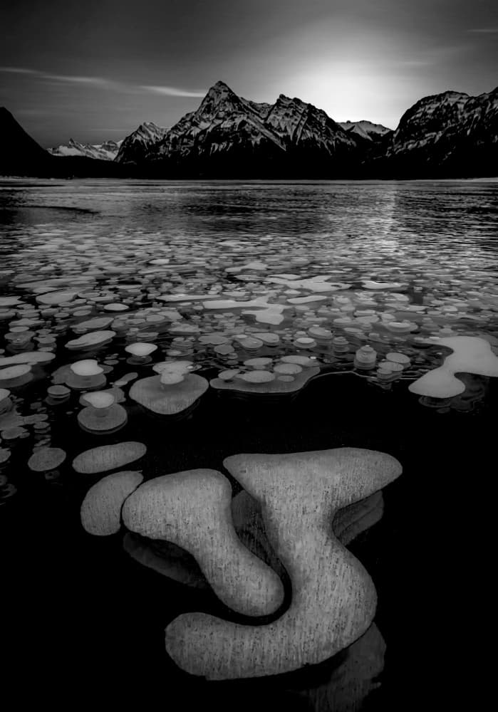 Mountain Lake Ice Bubbles by Jiahong Zeng — canvas wall art