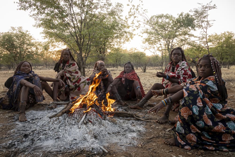 Women Around Campfire by Elena Molina — canvas wall art