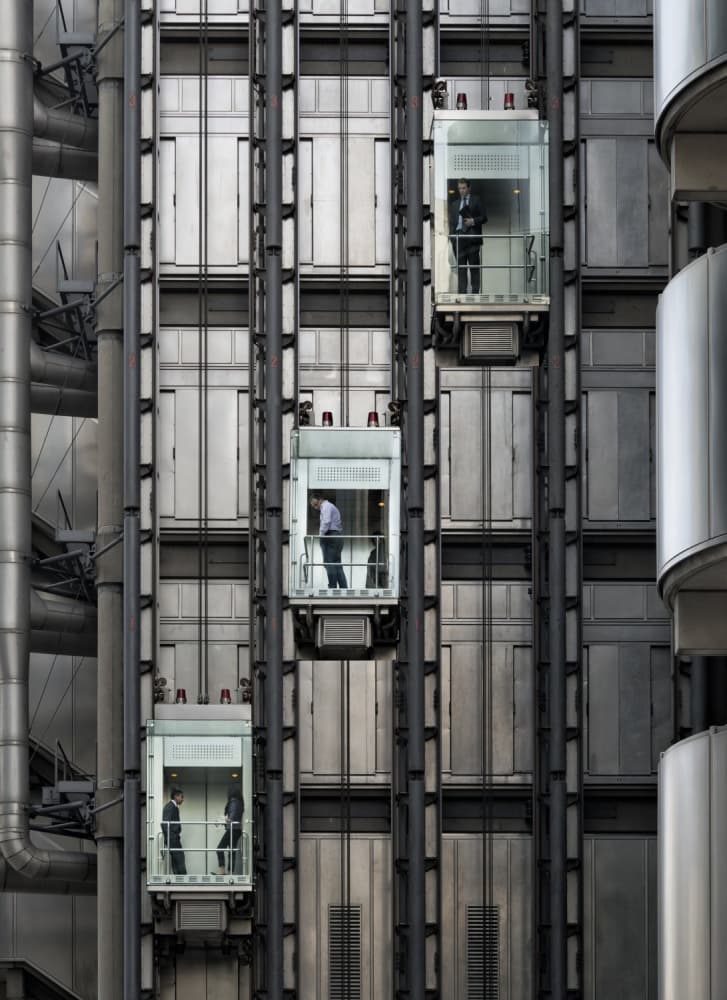 People In Modern Elevators by INIGO CIA — canvas wall art