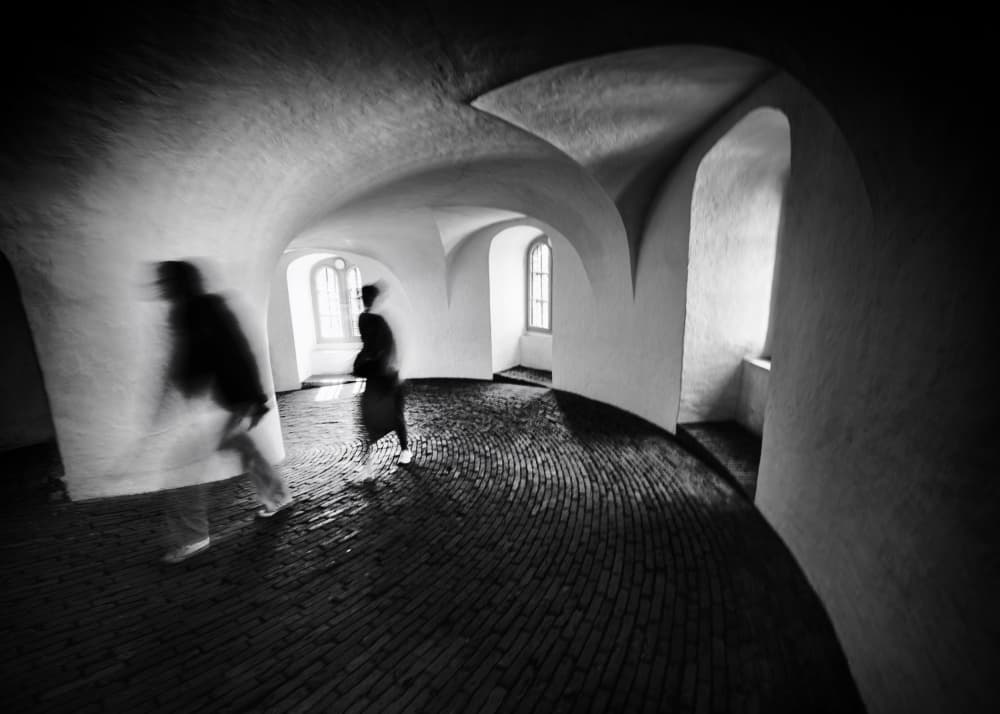 Blurred Hallway Figures by Louie Luo — canvas wall art