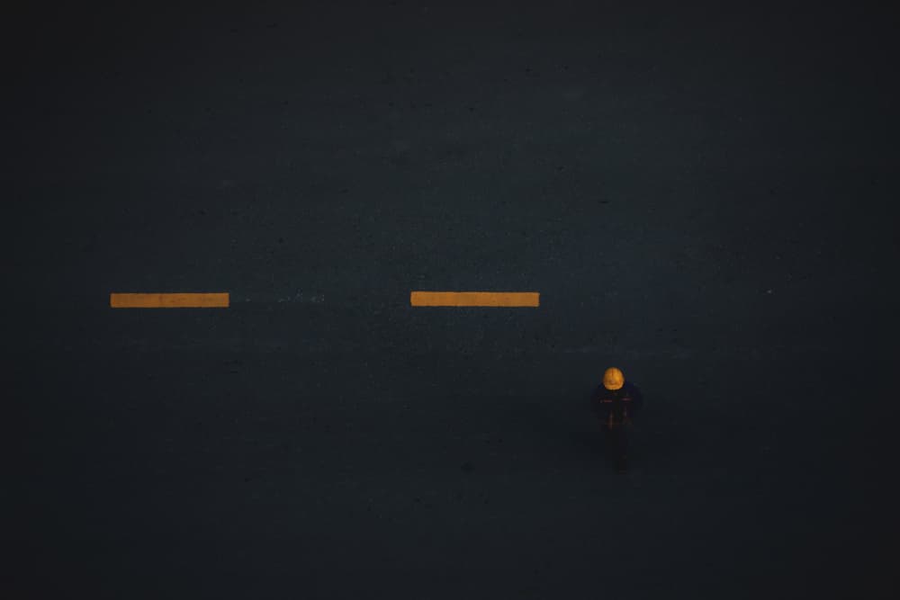 Dark Road Solitary Figure by Dzintra Zvagina — canvas wall art