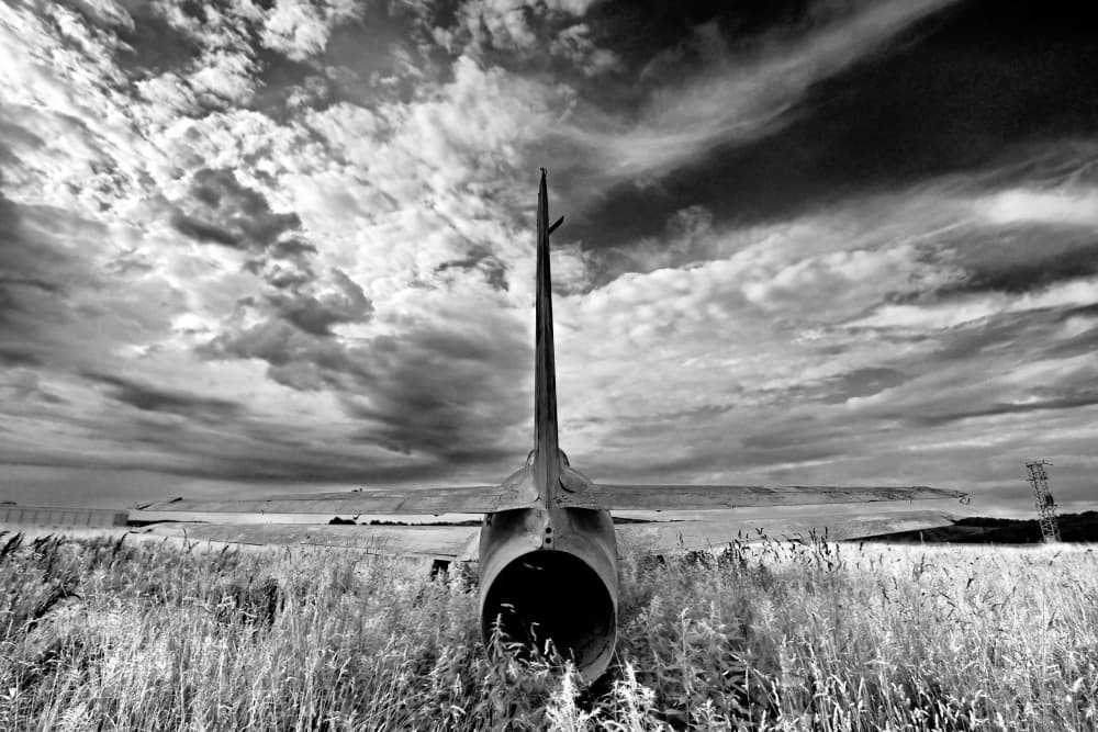 Abandoned Jet Under Stormy Sky by Bojan Bencic — canvas wall art