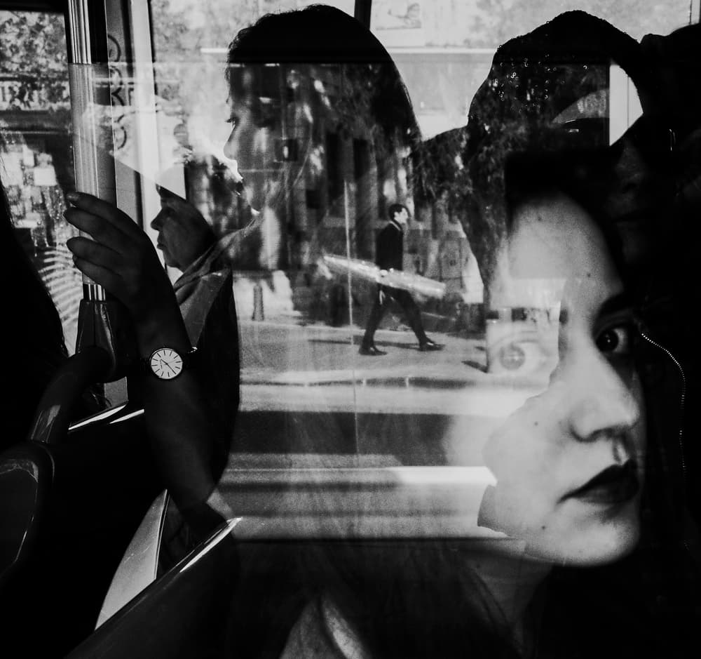Woman In City Reflection by Assaf Gavra — canvas wall art