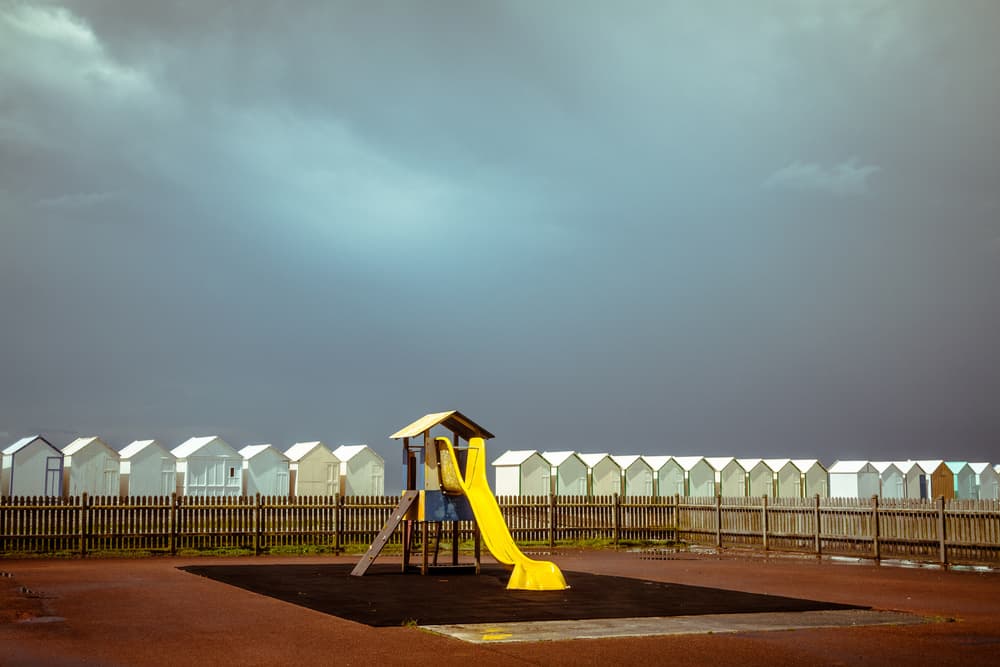 Yellow Slide Beach Huts by Michelle Degryse — canvas wall art