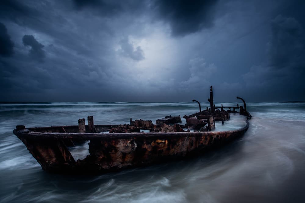 Stormy Beach Shipwreck by Farid Kazamil — canvas wall art
