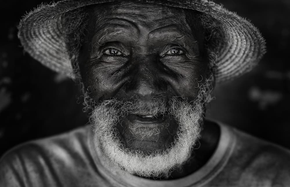 Smiling Elder Man by Moris Raskin — canvas wall art