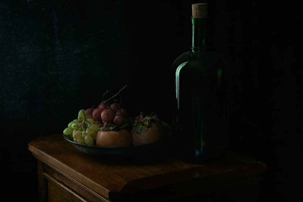 Moody Grapes And Bottle by Ramiz Sahin — canvas wall art
