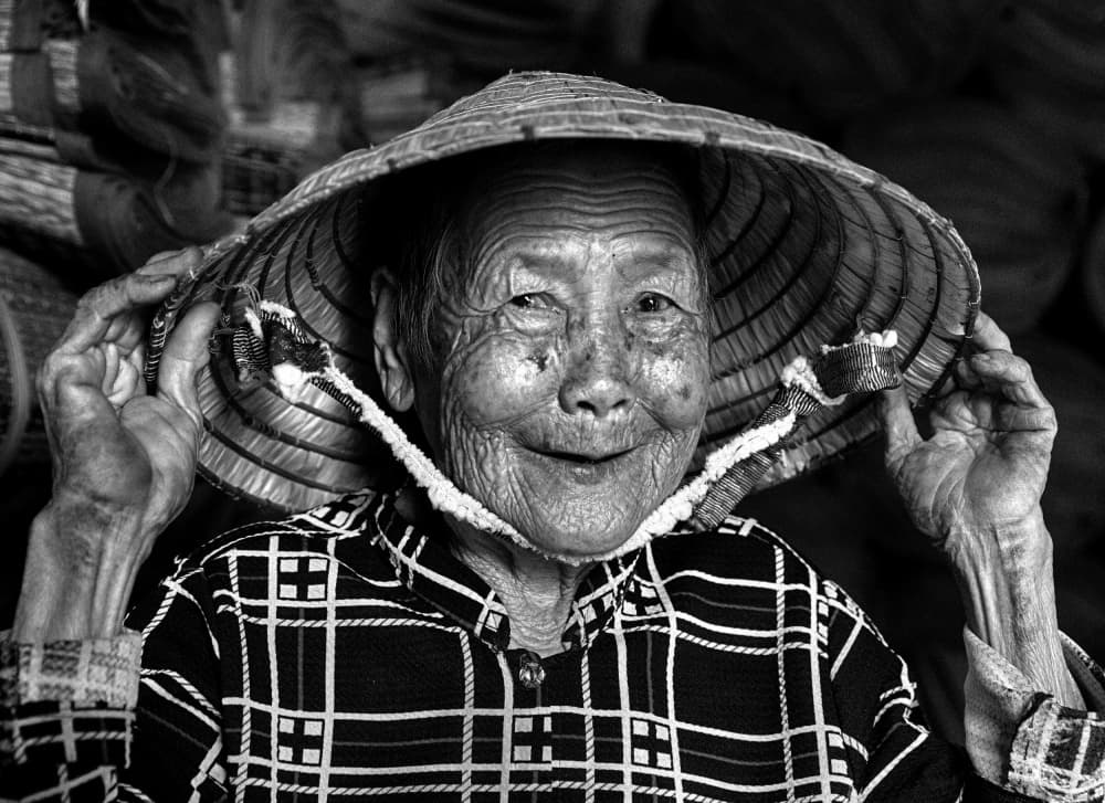 Vietnamese Woman's Smile by Angela Muliani Hartojo — canvas wall art