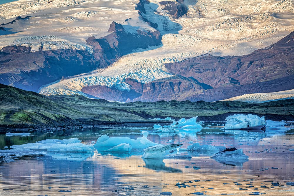 Glacial Lake Icebergs by Jeffrey C. Sink — canvas wall art