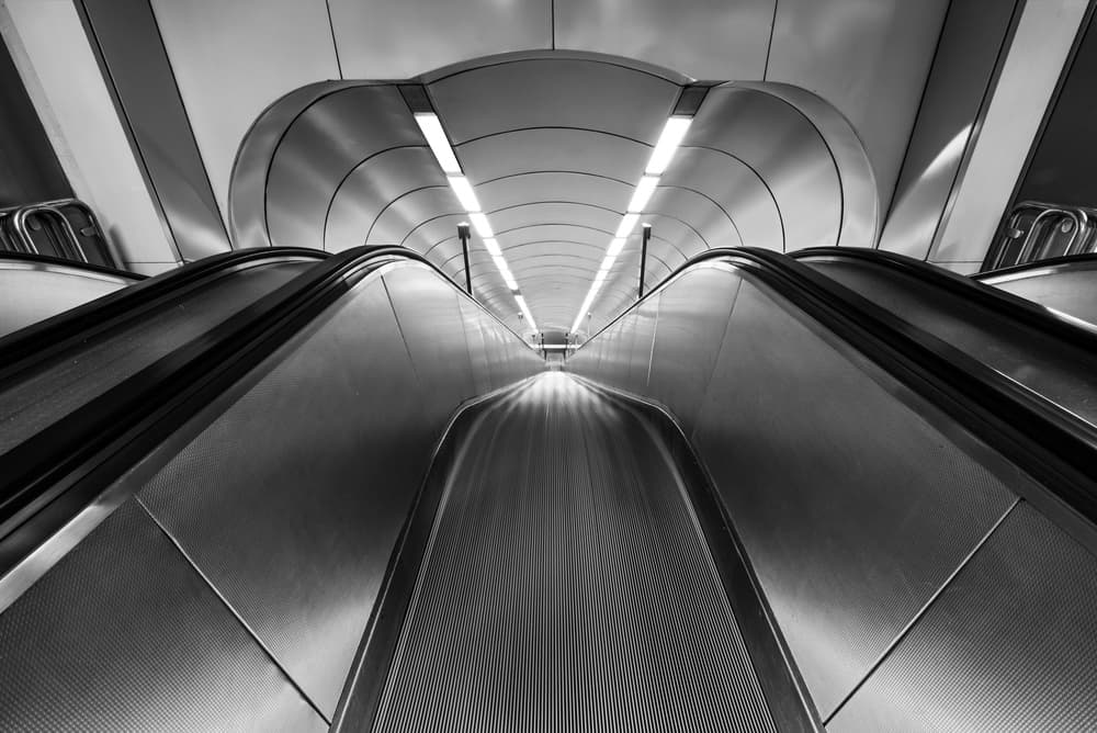 Modern Escalator Descent by fotomarion — canvas wall art