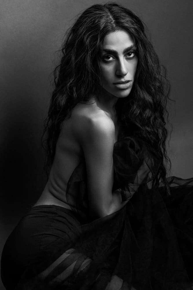 Woman's Dramatic Gaze by Mehdi Mokhtari — canvas wall art