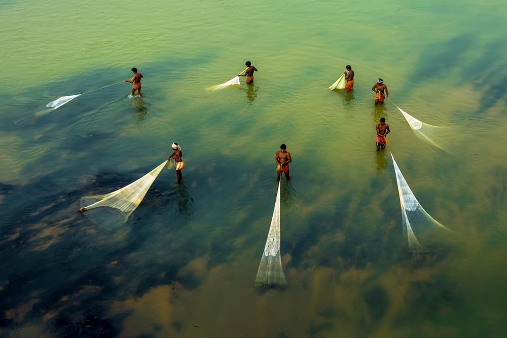 Traditional River Fishing by Saurabh Sirohiya — canvas wall art