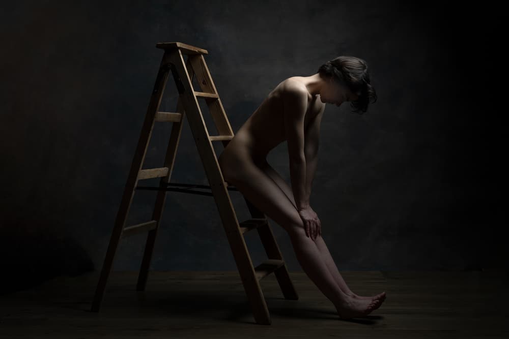 Pensive Woman and Ladder by Luc Stalmans — canvas wall art