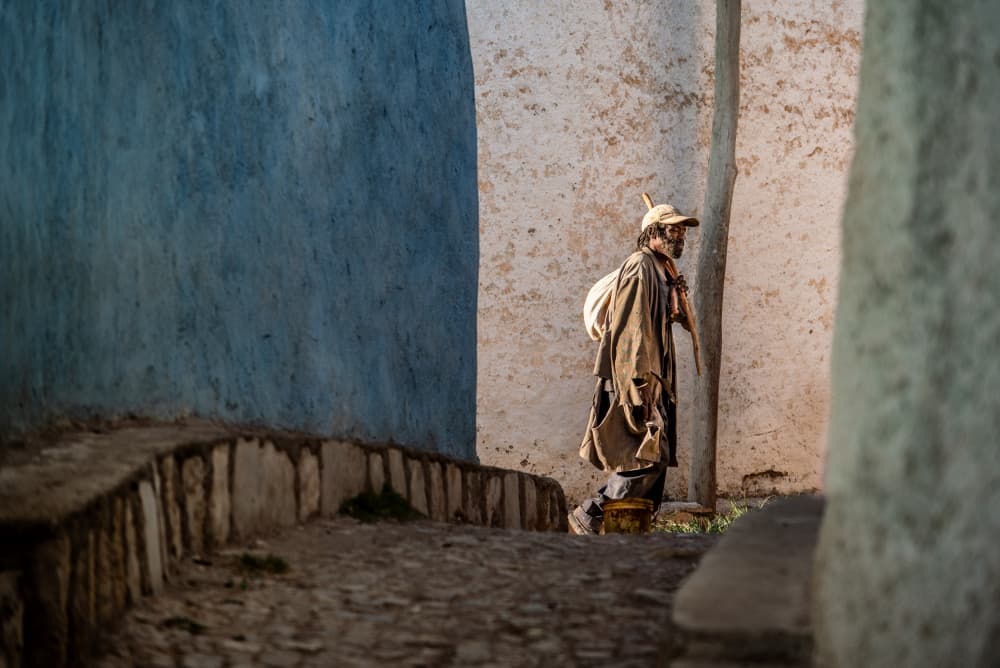 Man Walking Ancient Alley by Trevor Cole — canvas wall art