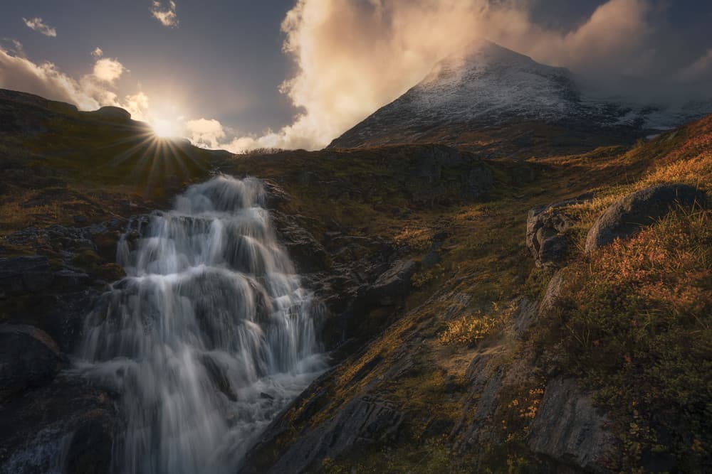 Sunlit Mountain Waterfall by Ole Henrik Skjelstad — canvas wall art