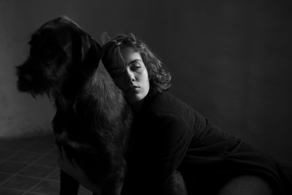 Woman and Dog Bond by Małgorzata Masarz — canvas wall art