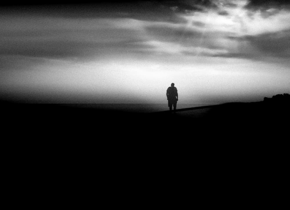 Solitary Man Under Sky by Monika Zemojtel — canvas wall art