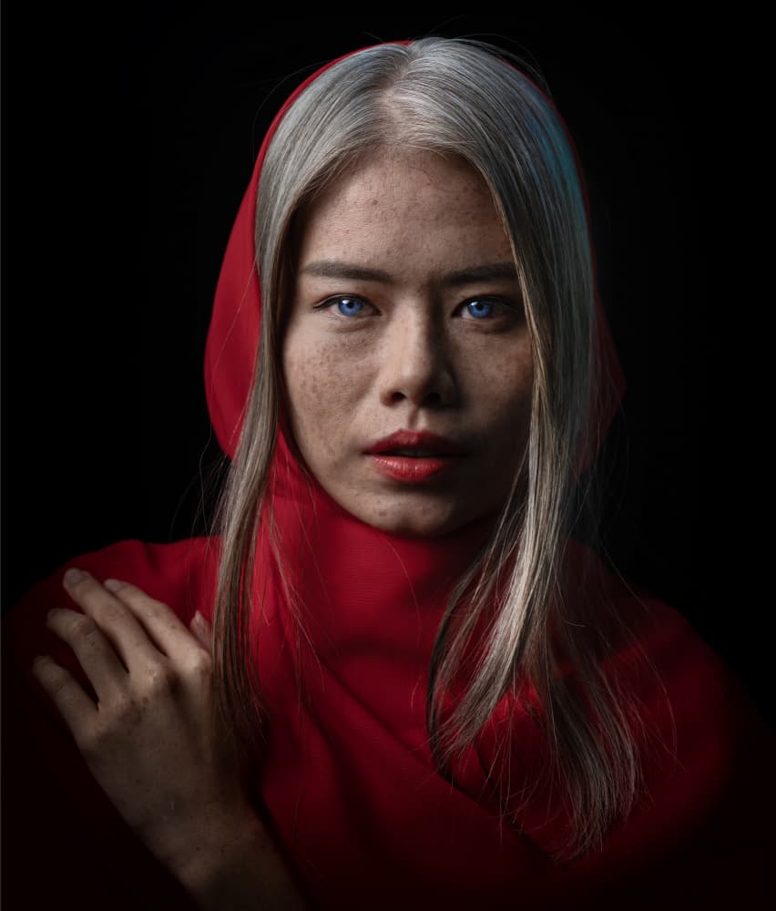 Red Hooded Woman by Fira Mikael — canvas wall art