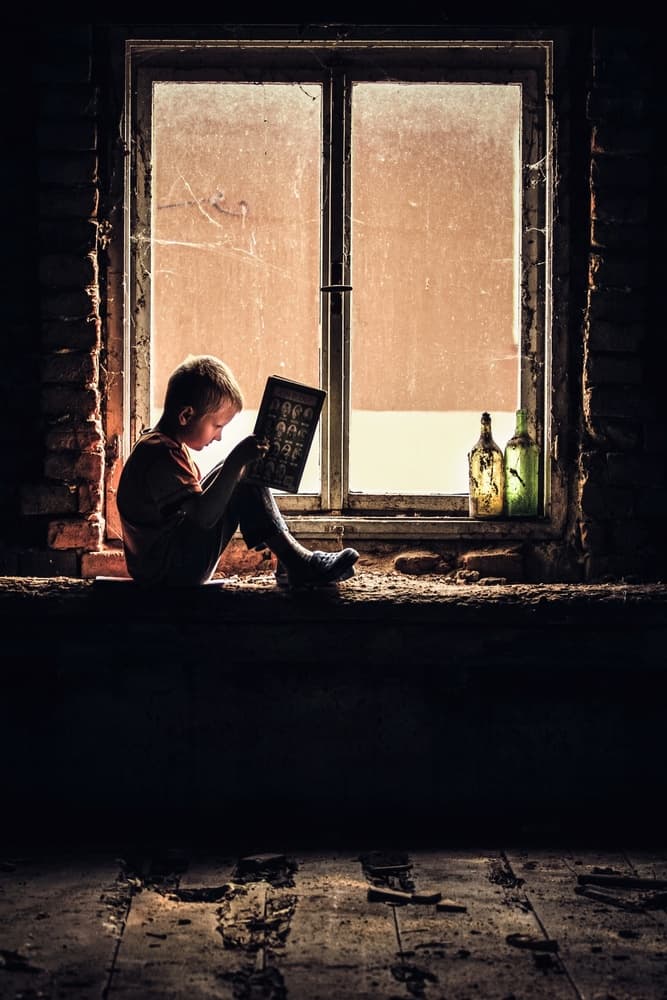 Boy Reading by Window by Patrik Valášek — canvas wall art