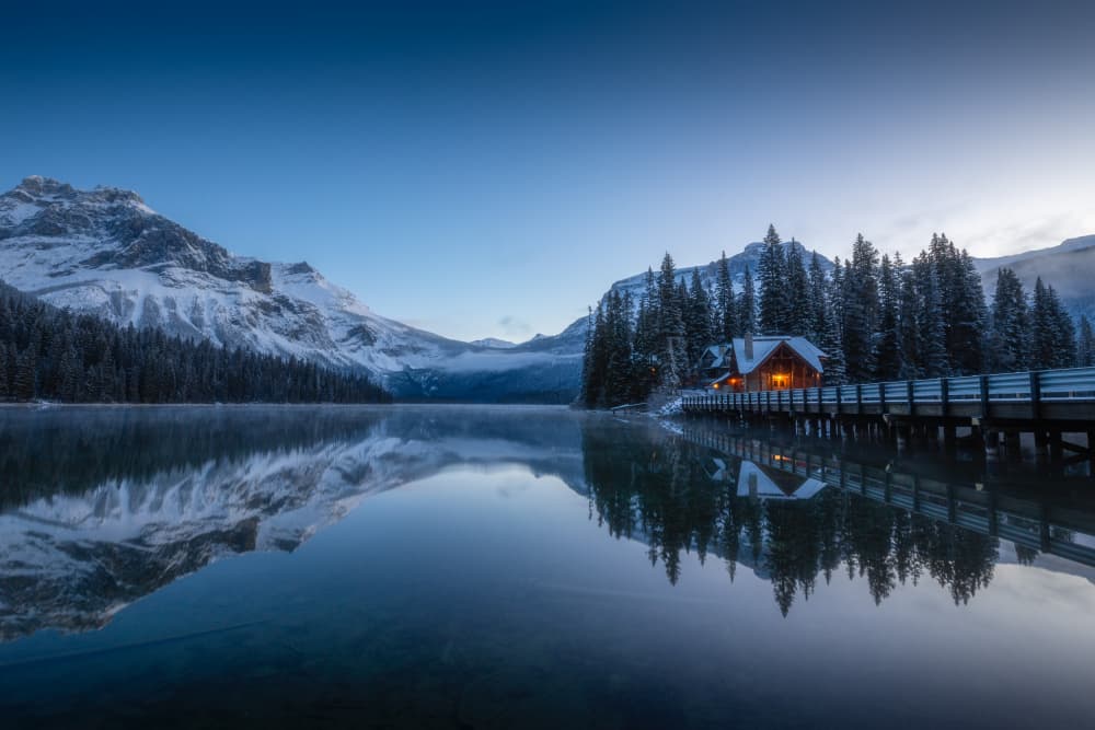 Winter Lake Cabin Glow by Ivan Macia — canvas wall art