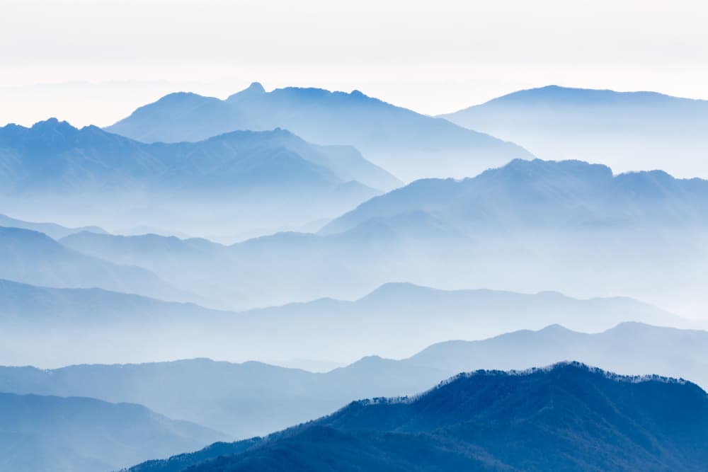 Misty Blue Mountains by Gwangseop Eom — canvas wall art