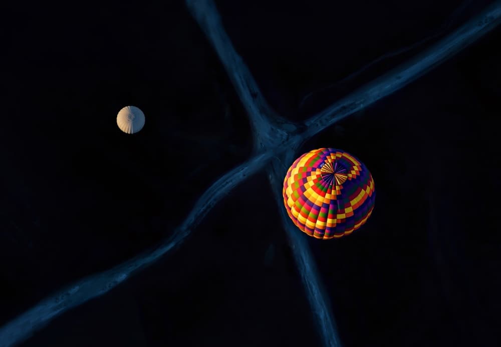 Floating Above Darkness by Juan Luis Duran — canvas wall art