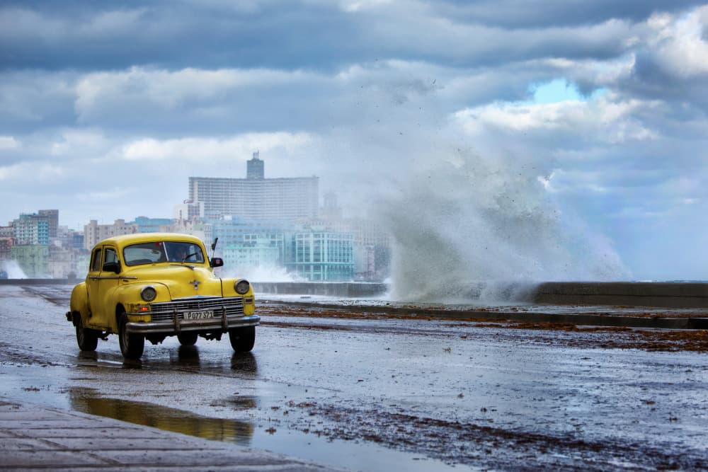 Havana Yellow Car Drama by Dan Mirica — canvas wall art