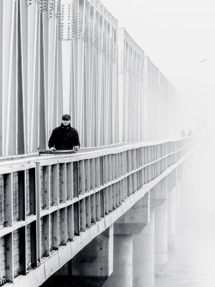 Man on a Misty Bridge by Saad Salem — canvas wall art