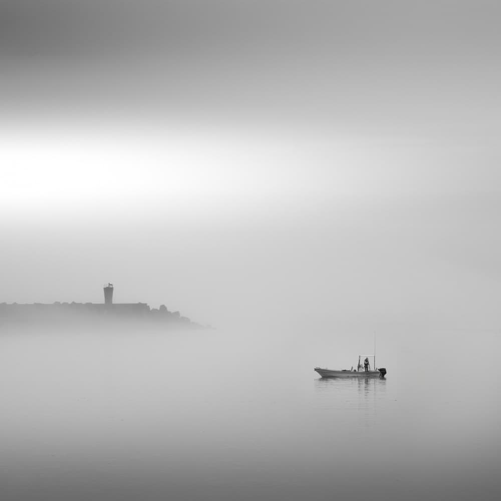Lone Boat Foggy Lighthouse by Takafumi Yamashita — canvas wall art