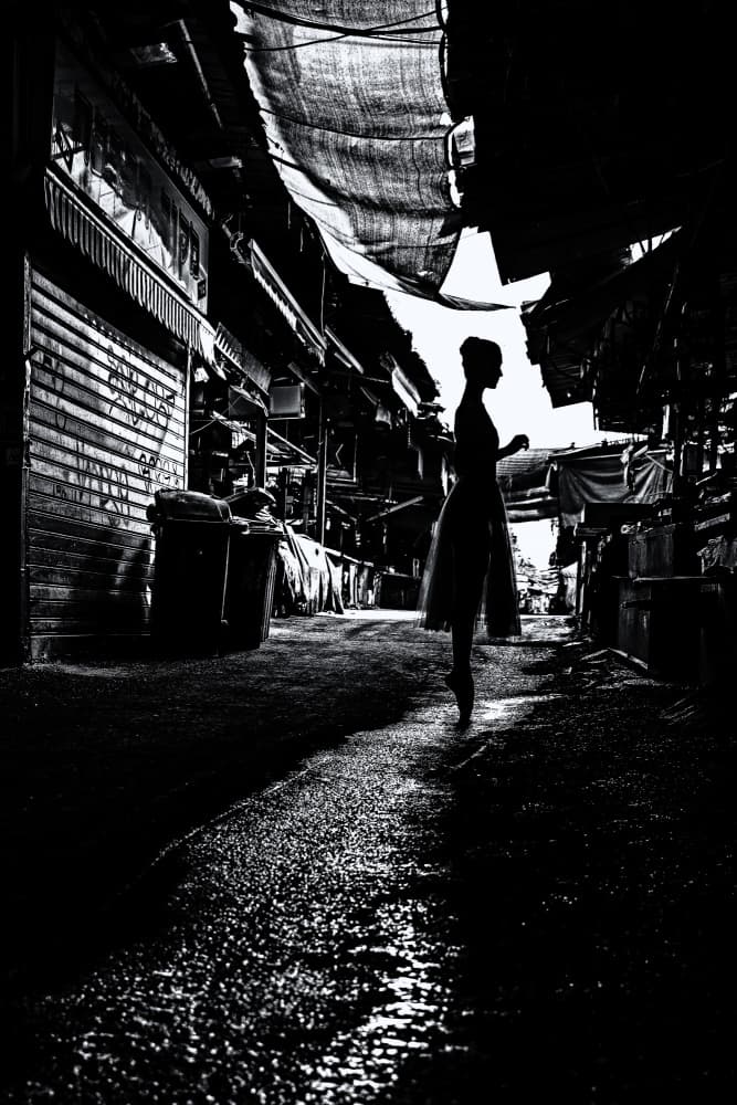 Street Ballet Silhouette by Amnon Eichelberg — canvas wall art