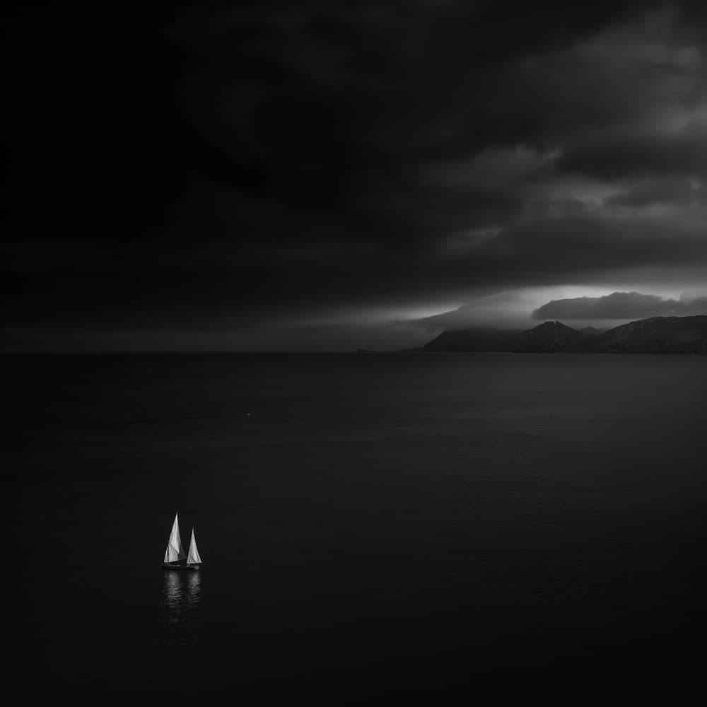 Lone Sailboat Dark Sea by Marco Antonio Cobo — canvas wall art