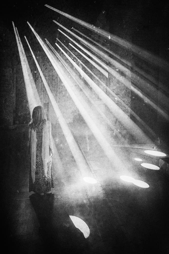 Woman In Dramatic Light by Enrico Facchetti — canvas wall art