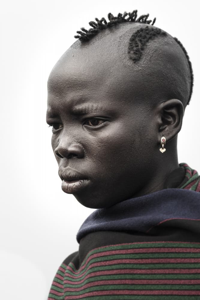 Pensive African Woman by Elena Molina — canvas wall art