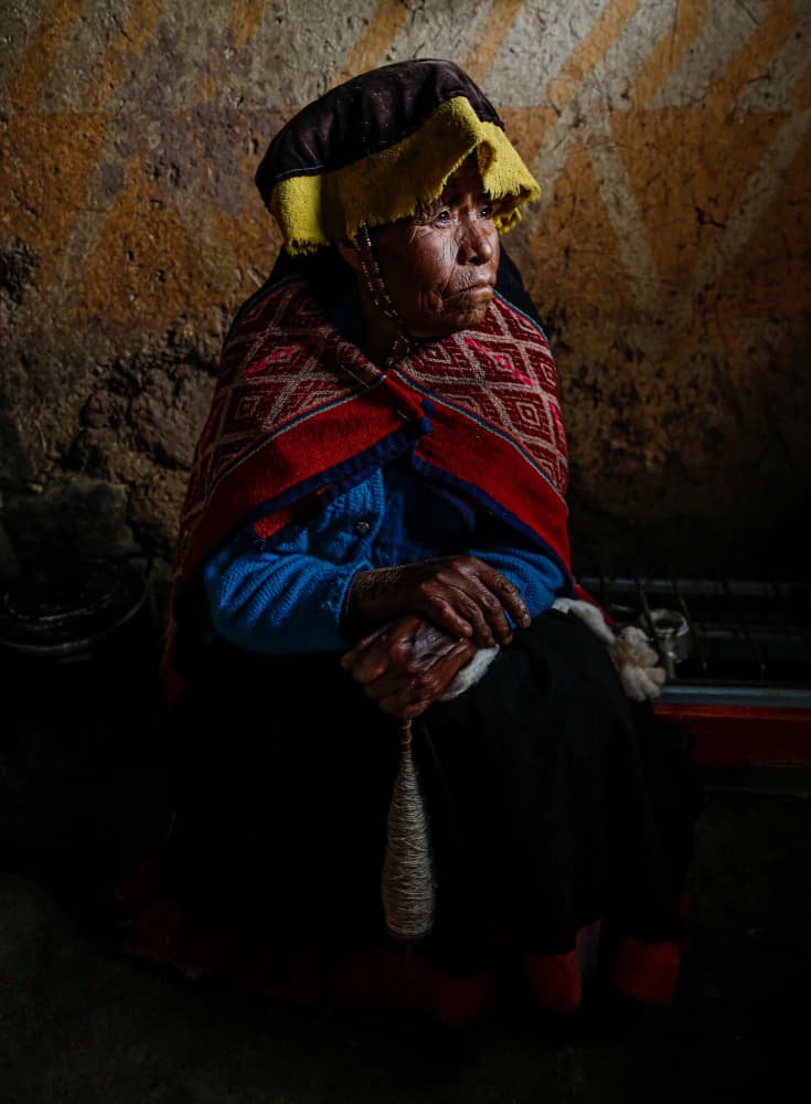 Andean Woman Spinning Yarn by anapaulaa88 — canvas wall art