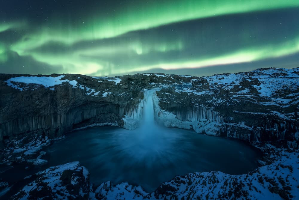 Aurora Waterfall Glow by David Martin Castan — canvas wall art