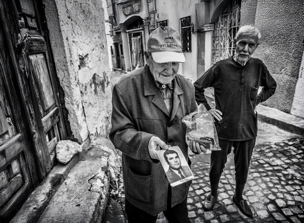 Elderly Man's Street Memory by Ömer Ates Kızıltug — canvas wall art