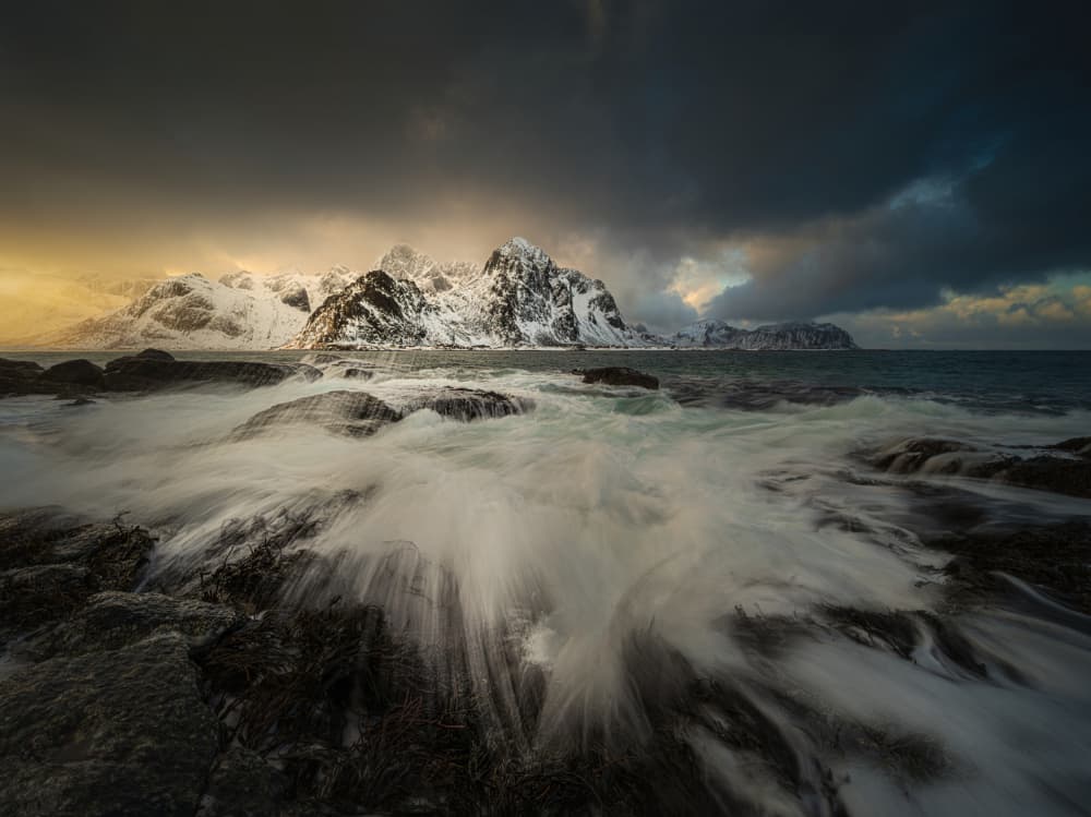 Snowy Peaks Ocean Waves by Radek Pohnan — canvas wall art