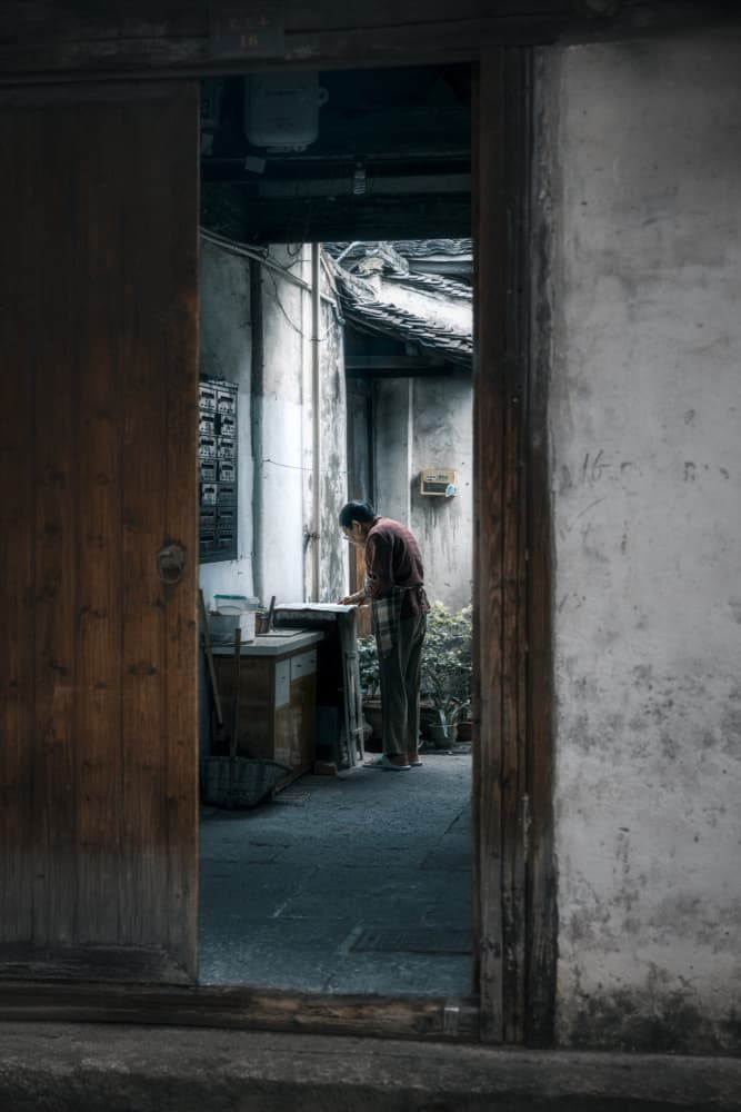 Man In Traditional Alley by Frank Ma — canvas wall art