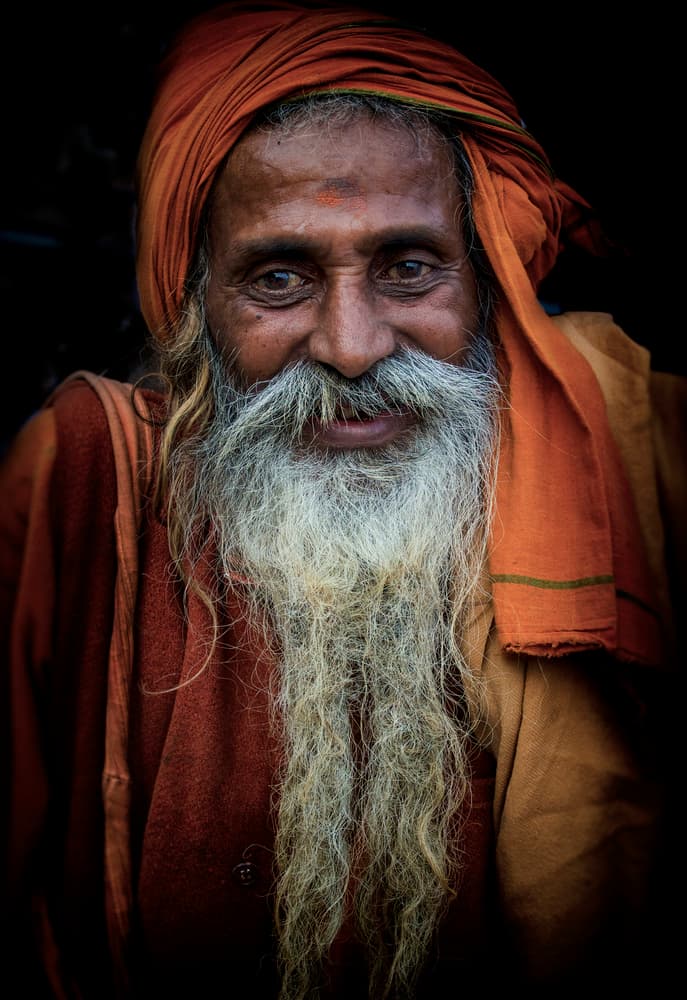 Smiling Indian Sadhu by Elena Molina — canvas wall art