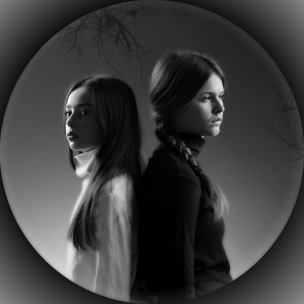 Sisters Standing Back to Back by Itzik Rabinovitz — canvas wall art