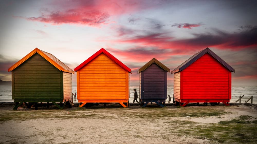 Colorful Beach Huts Sunset by Martin Wong — canvas wall art