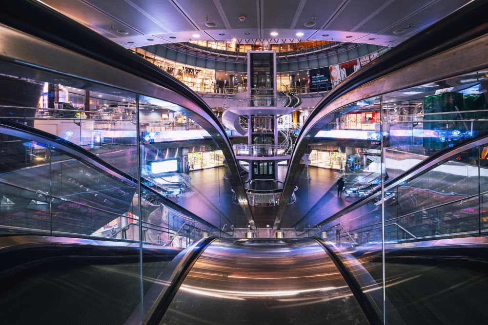 Vibrant Mall Escalators by Rene Tenteris — canvas wall art