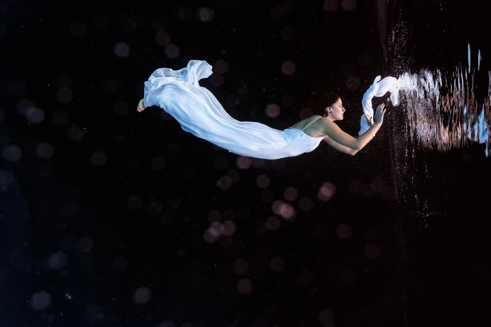 Graceful Woman Underwater by Petr Kleiner — canvas wall art