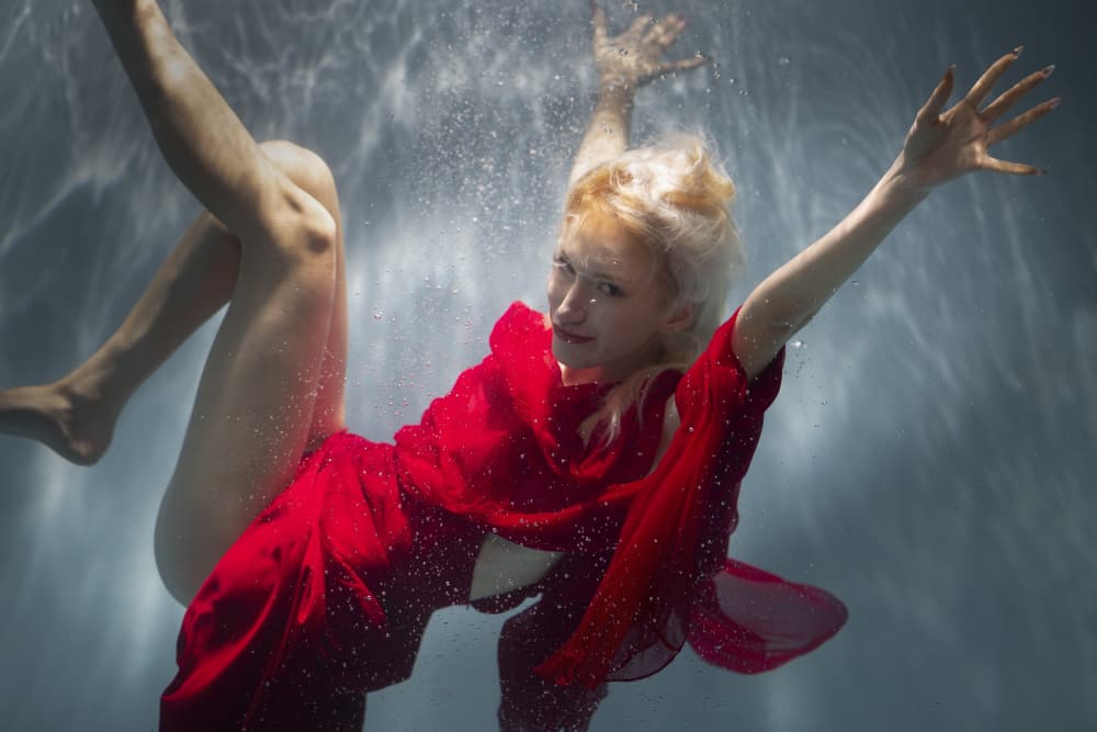 Graceful Red Dress Underwater by Enis Onur — canvas wall art