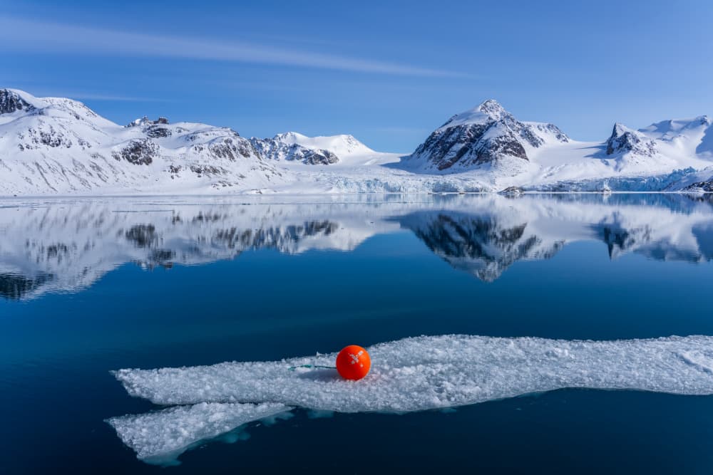 Orange Ball Glacier Reflection by Rajat Dhesi — canvas wall art