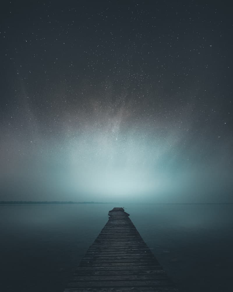 Misty Starry Pier by Andrea Fraccaroli — canvas wall art